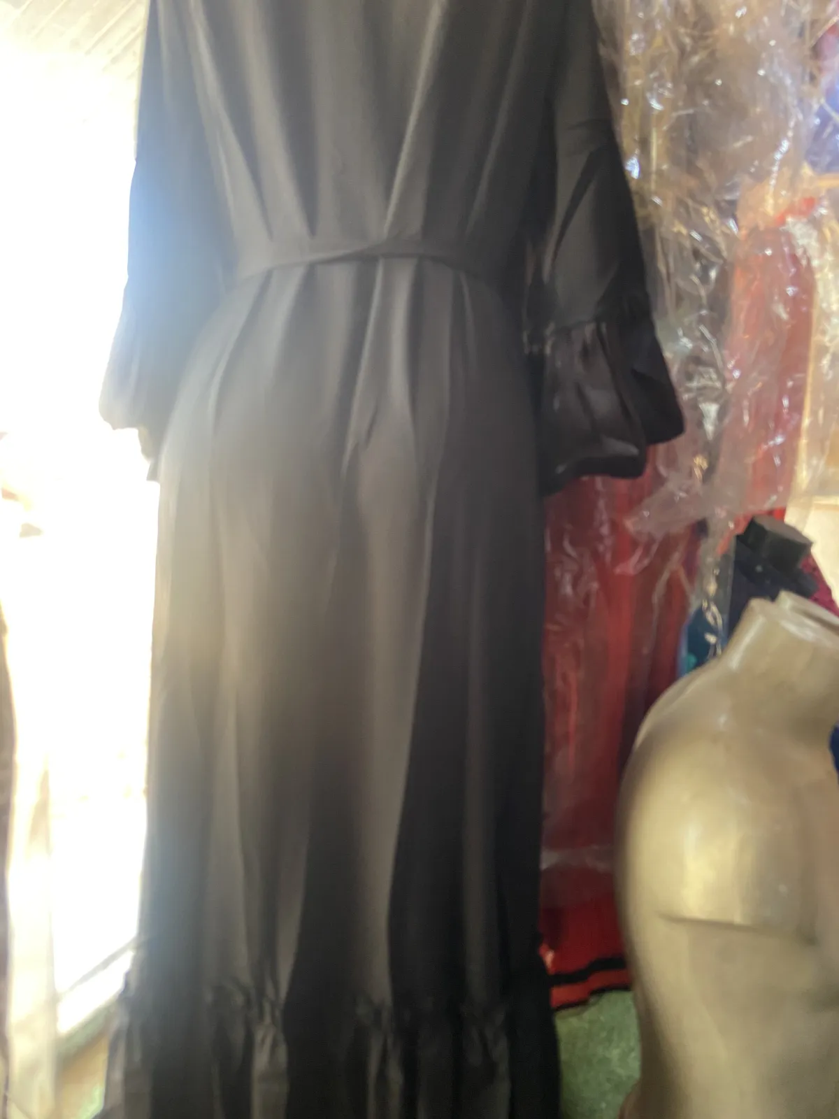 Miniature Longue robe évasée noire